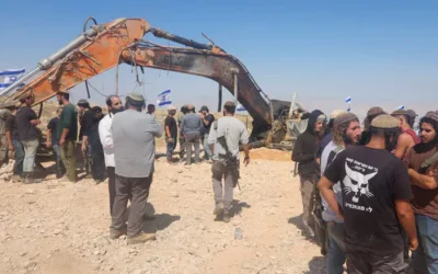 Watch: Excavator used by contractor killed in Gaza placed next to his grave