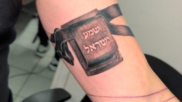 Tefillin ink sparks outrage, but ex-Haredi tattoo artist says it came from faith, not mockery