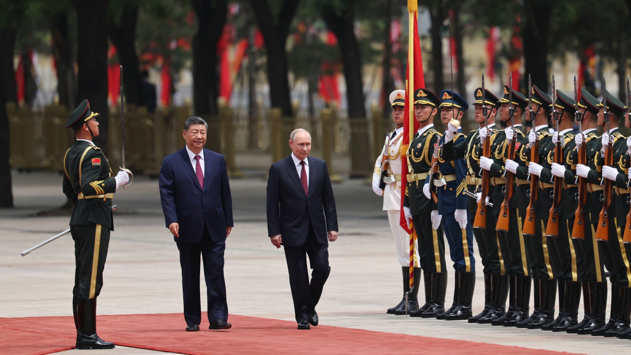 Days After Hosting Trump, Xi Deepens Ties With Putin