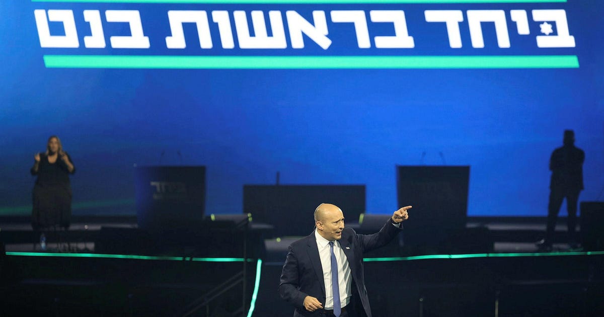 Bennett vows October 7 probe, constitution as first acts in government at party conference with Lapid