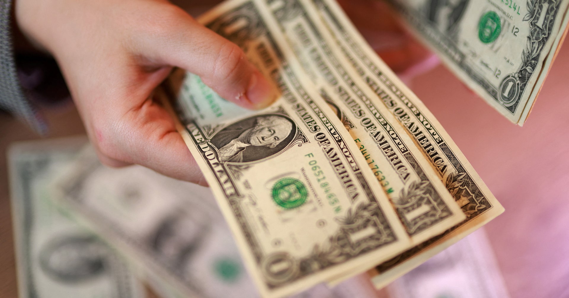 Dollar near one-week high as hot U.S. inflation fans Fed hike bets, peace talks stall