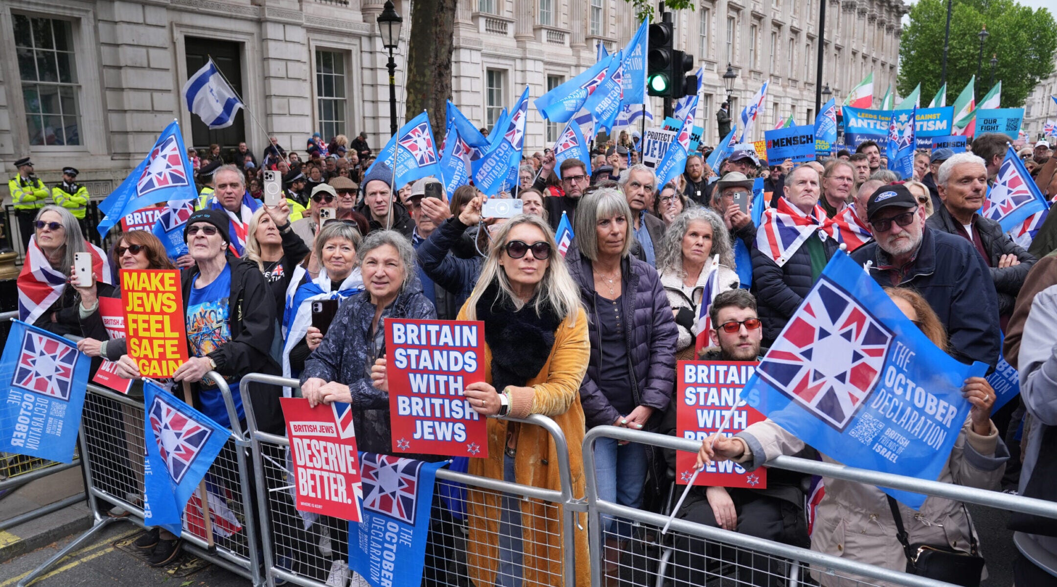 Labour politician is booed as thousands rally against antisemitism in London