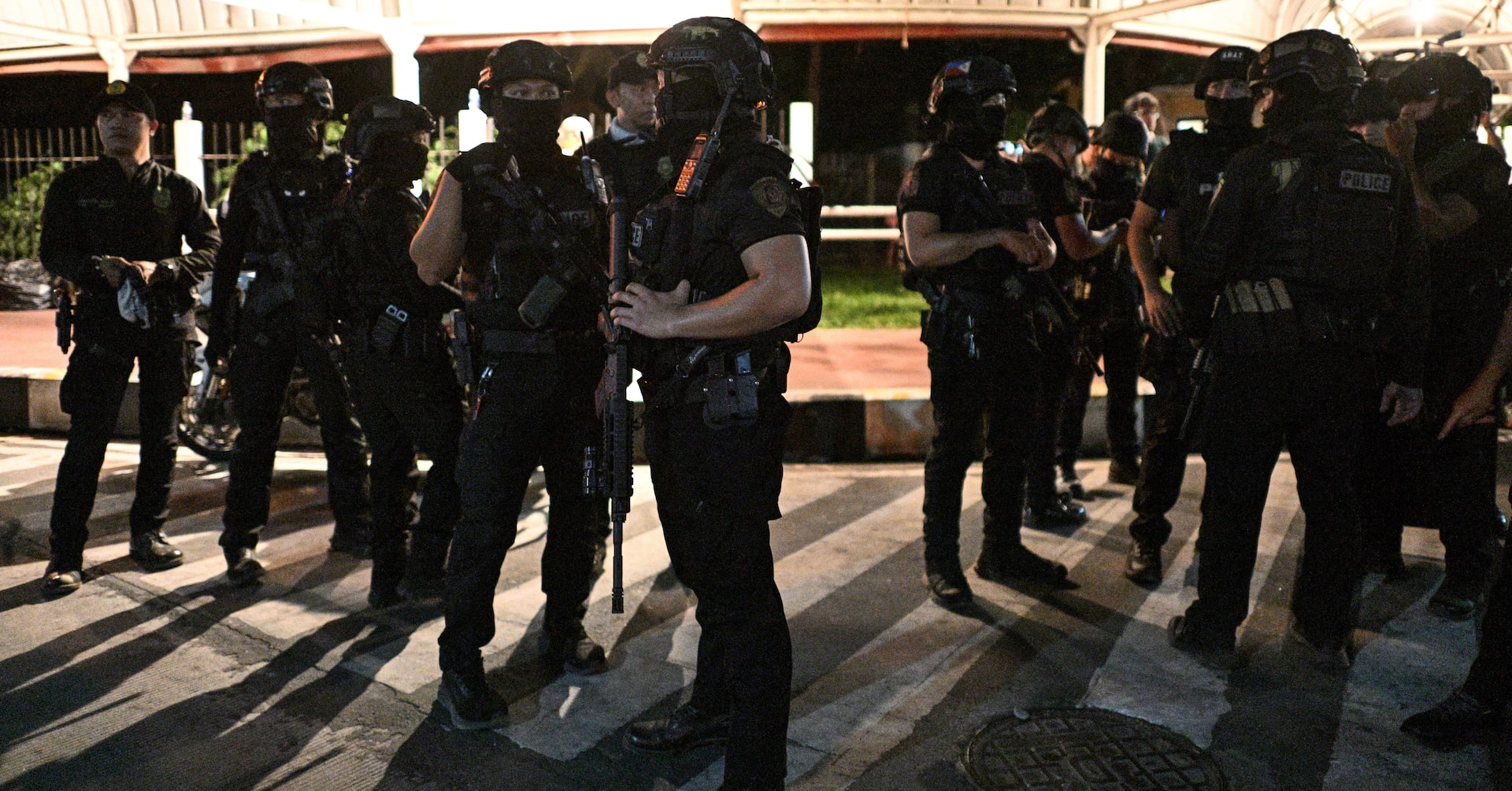 Philippine president calls emergency meeting after chaos and shooting at Senate