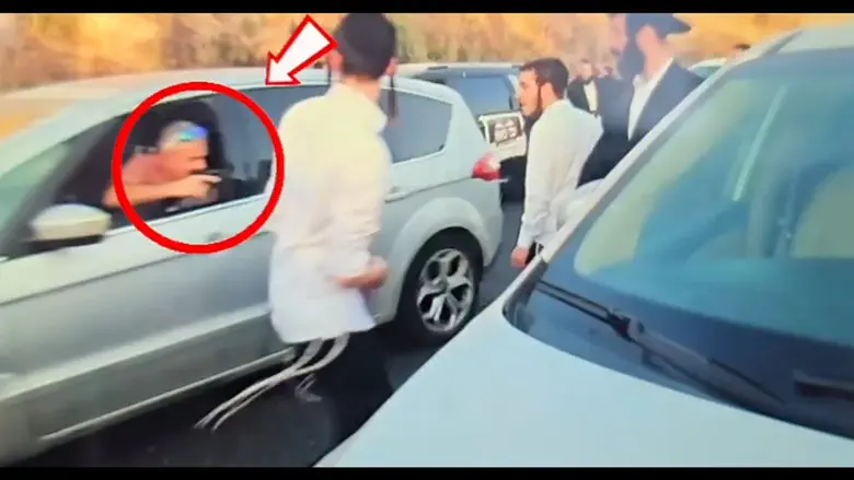 Court releases man filmed pointing gun at haredi protesters to house arrest