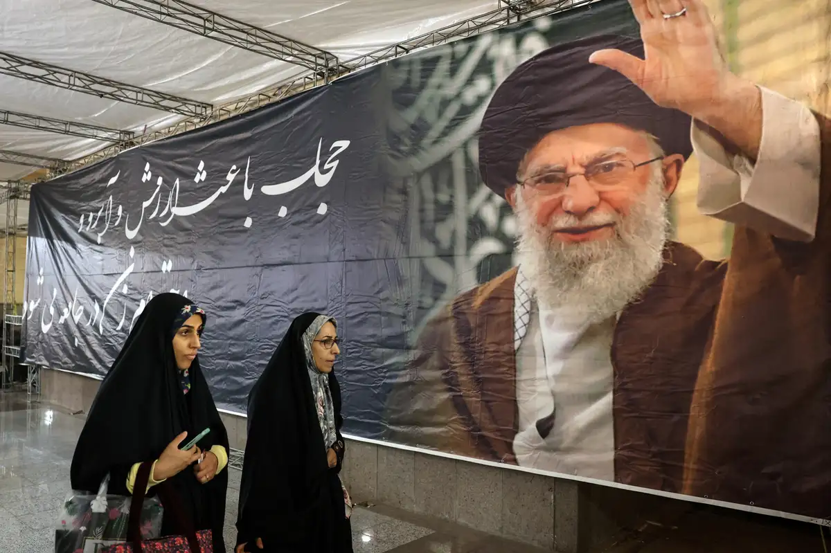 Regime supporters in Iran protest over agreement to end war