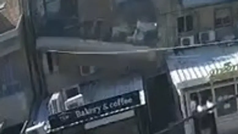 Video captures moment balcony collapses onto bakery in Jerusalem
