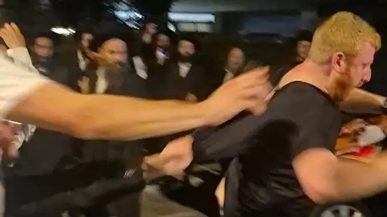 Watch: Haredi mob assaults IDF reservist