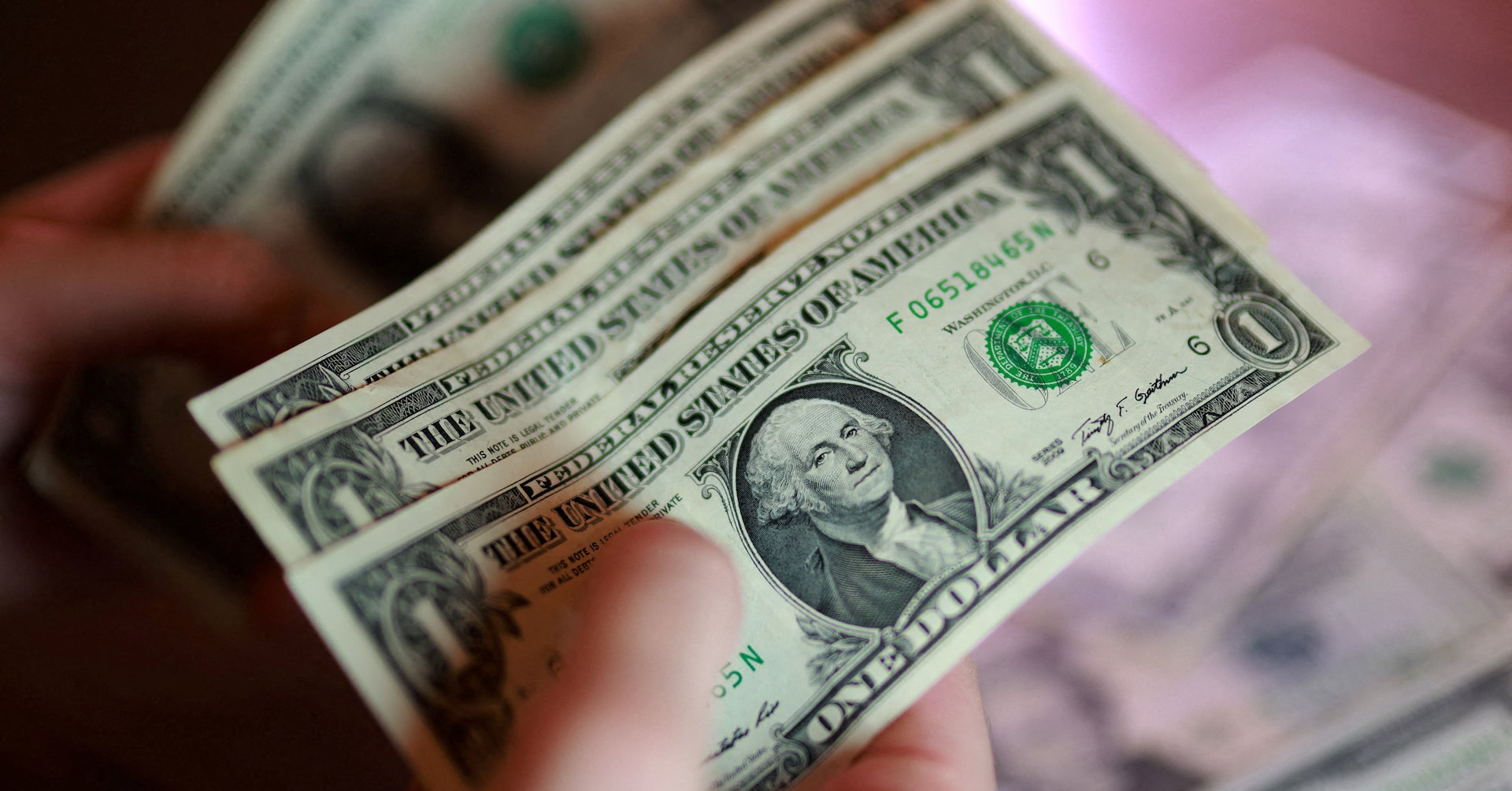 Dollar near one-month low as cooling inflation curbs Fed hike bets