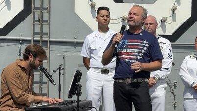 Freed hostage Alon Ohel marks America 250 with piano performance on USS Nimitz | Watch
