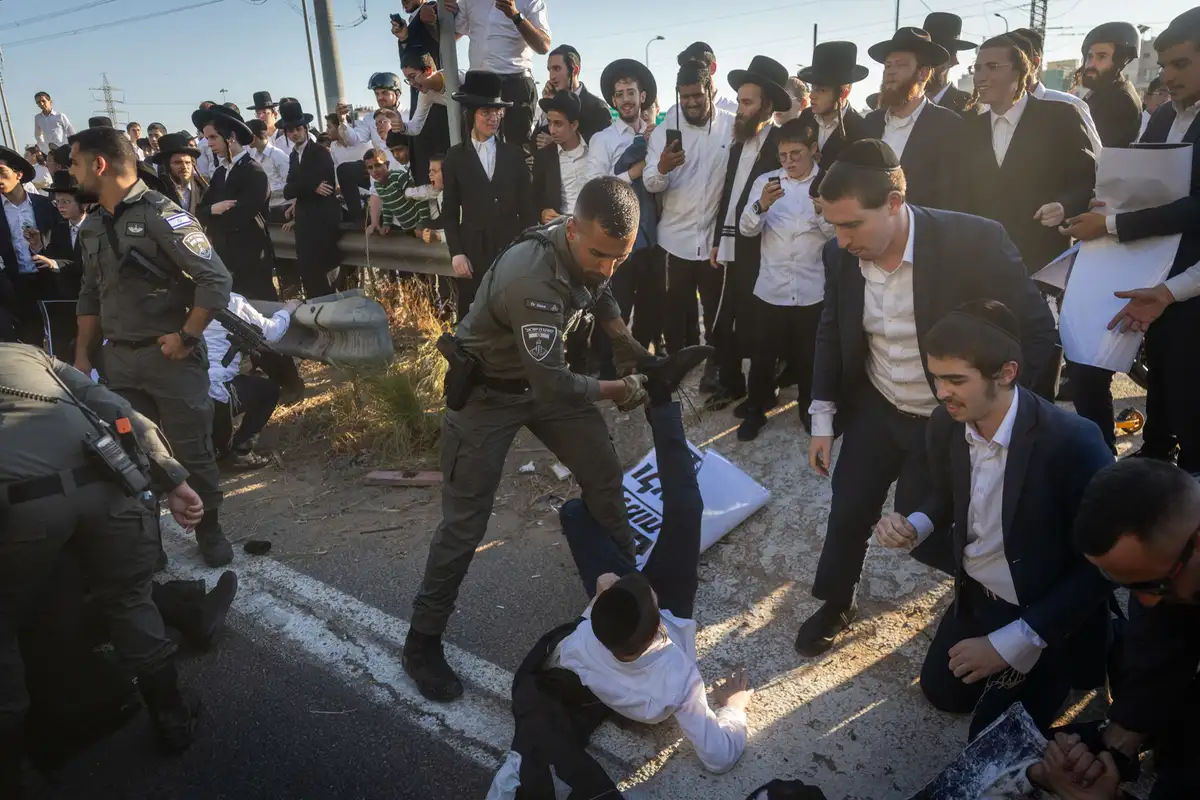 Charedi draft protests turn ugly as tax inspectors attacked in Bnei Brak