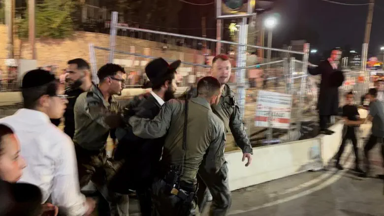 Chaos in Jerusalem: Rioters torch bins, tear down light rail barriers