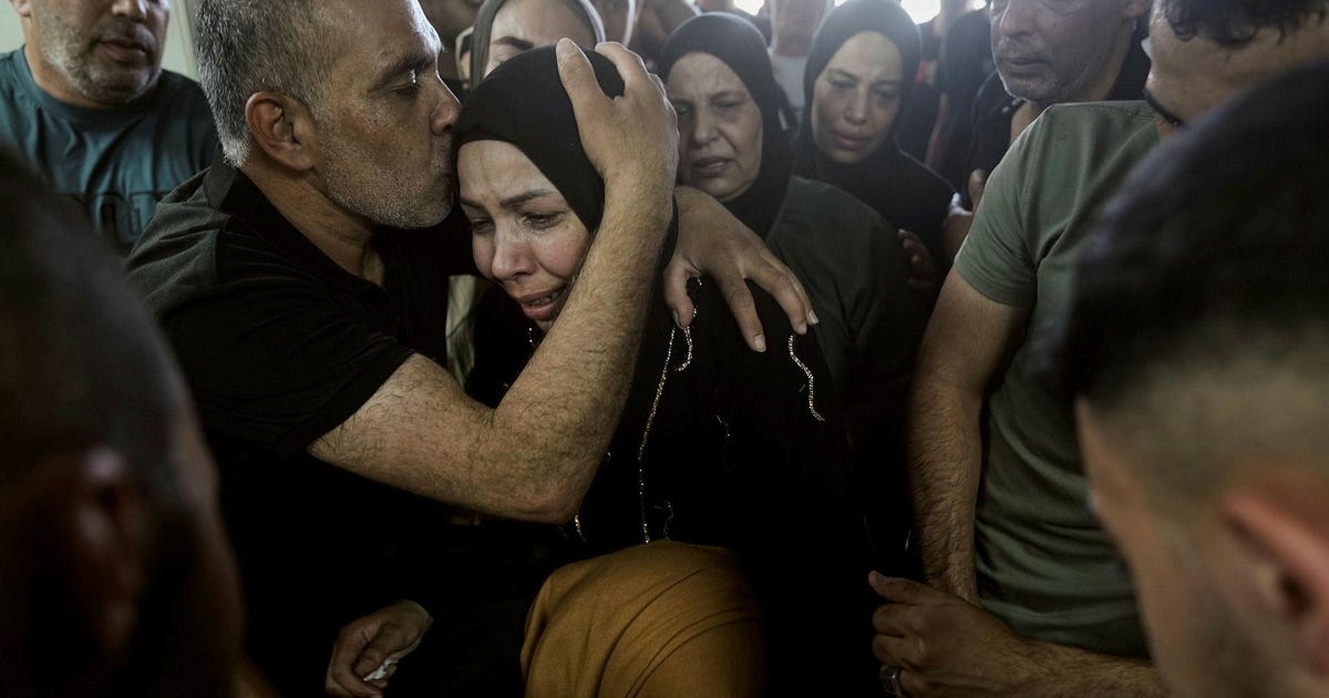 IDF soldiers kill 14-year-old, hang Israeli flag on mosque in two raids on West Bank camps