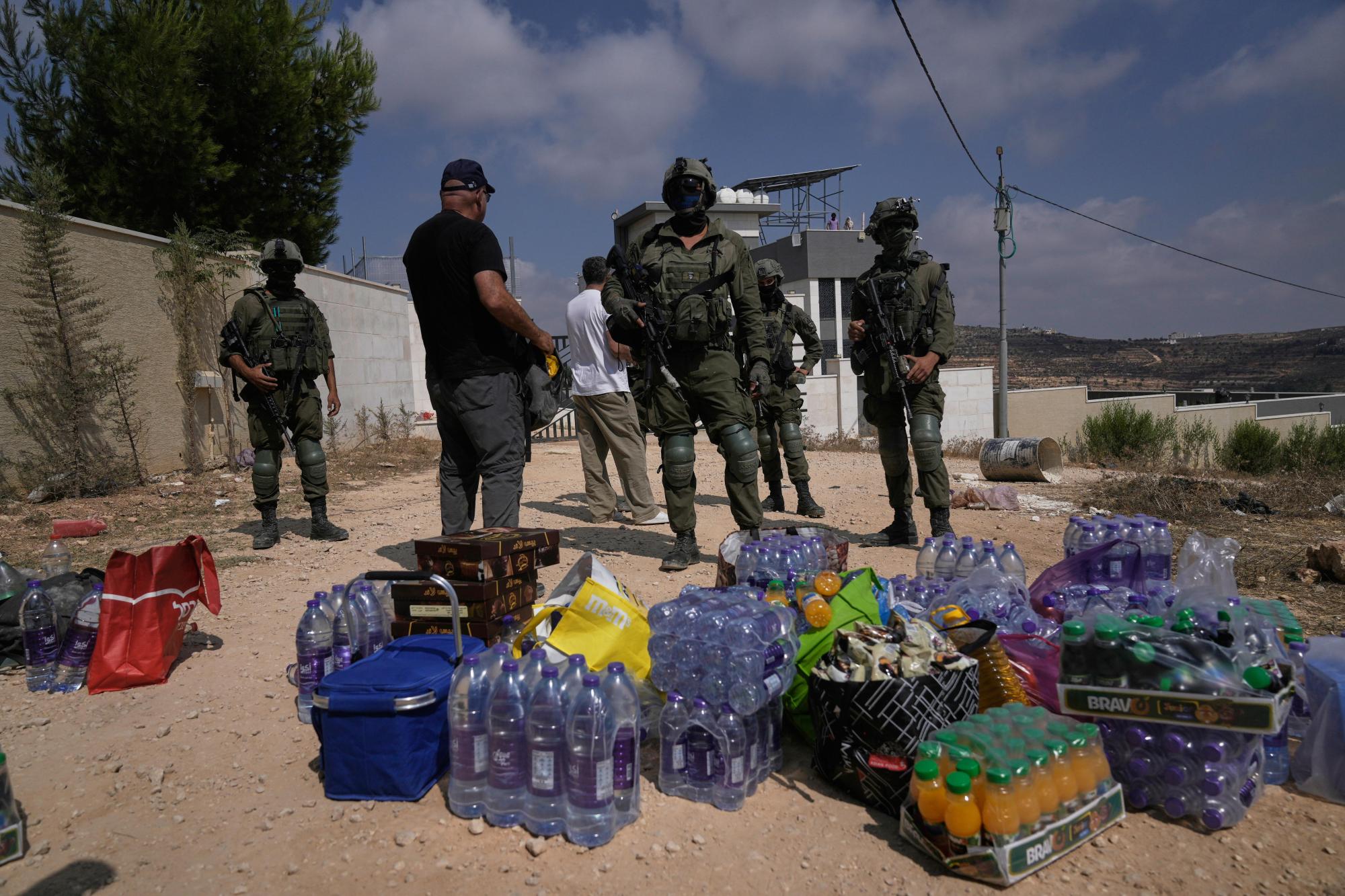 ​Palestinians besieged in West Bank village fear Israeli settlers will seize their homes 