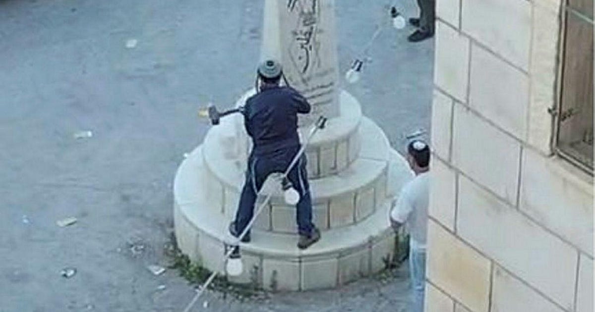 Far-right lawmaker Tzvi Succot smashes Palestinian monument in West Bank guarded by IDF