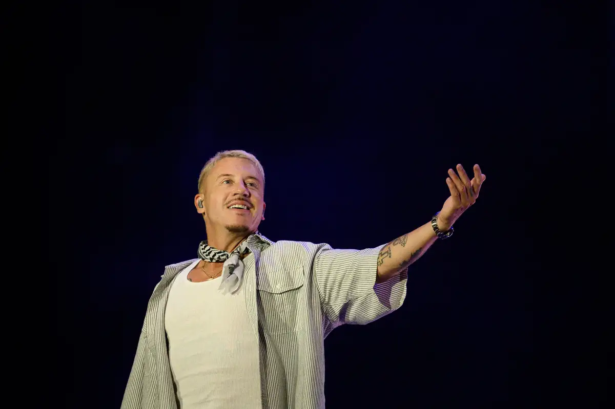 Macklemore dropped from Ed Sheeran tour after concert venues threaten cancellation