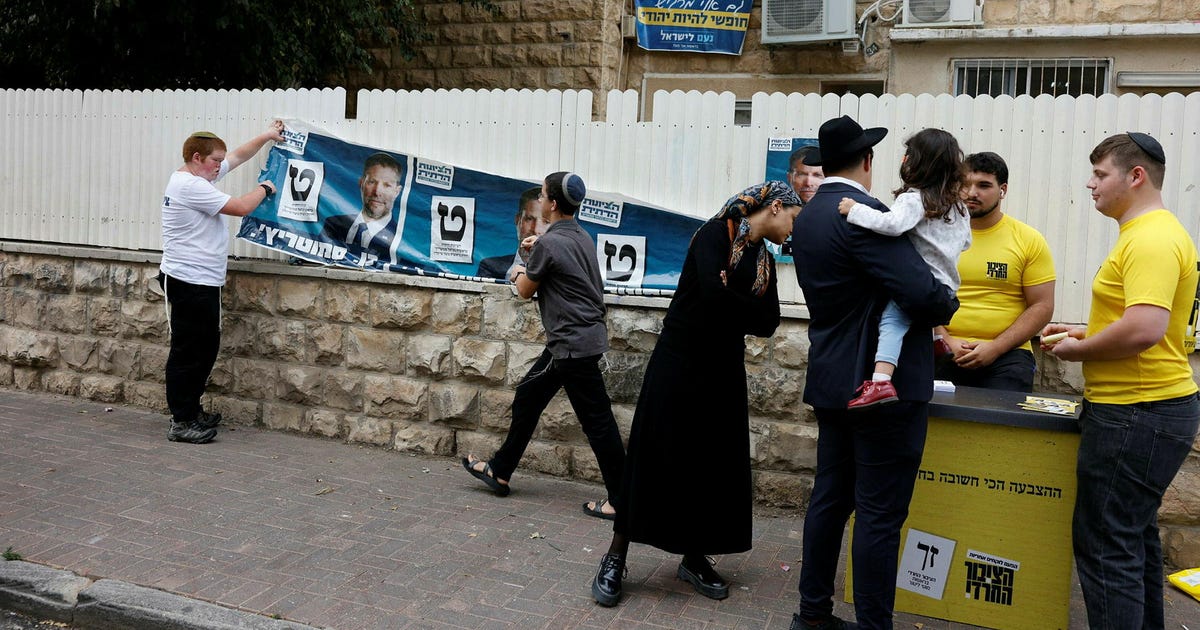 Kippot with pictures of rabbis, a willow branch for every voter: Election Day in the ultra-Orthodox street
