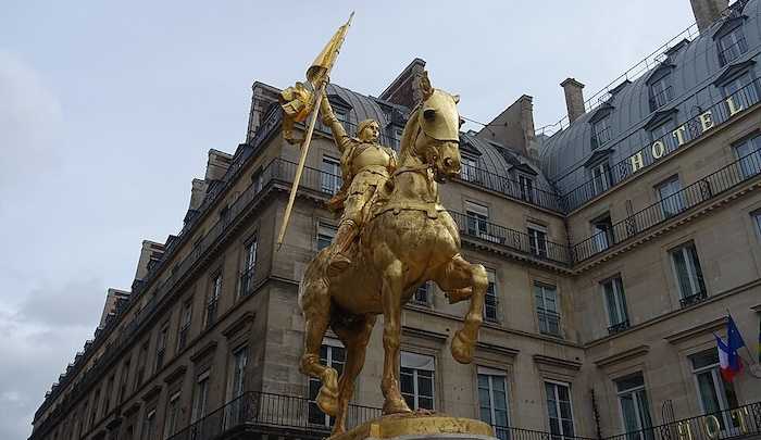 Muslims Desecrate Statues of Joan of Arc With Hijab and ‘Palestinian’ Flag | Frontpage Mag